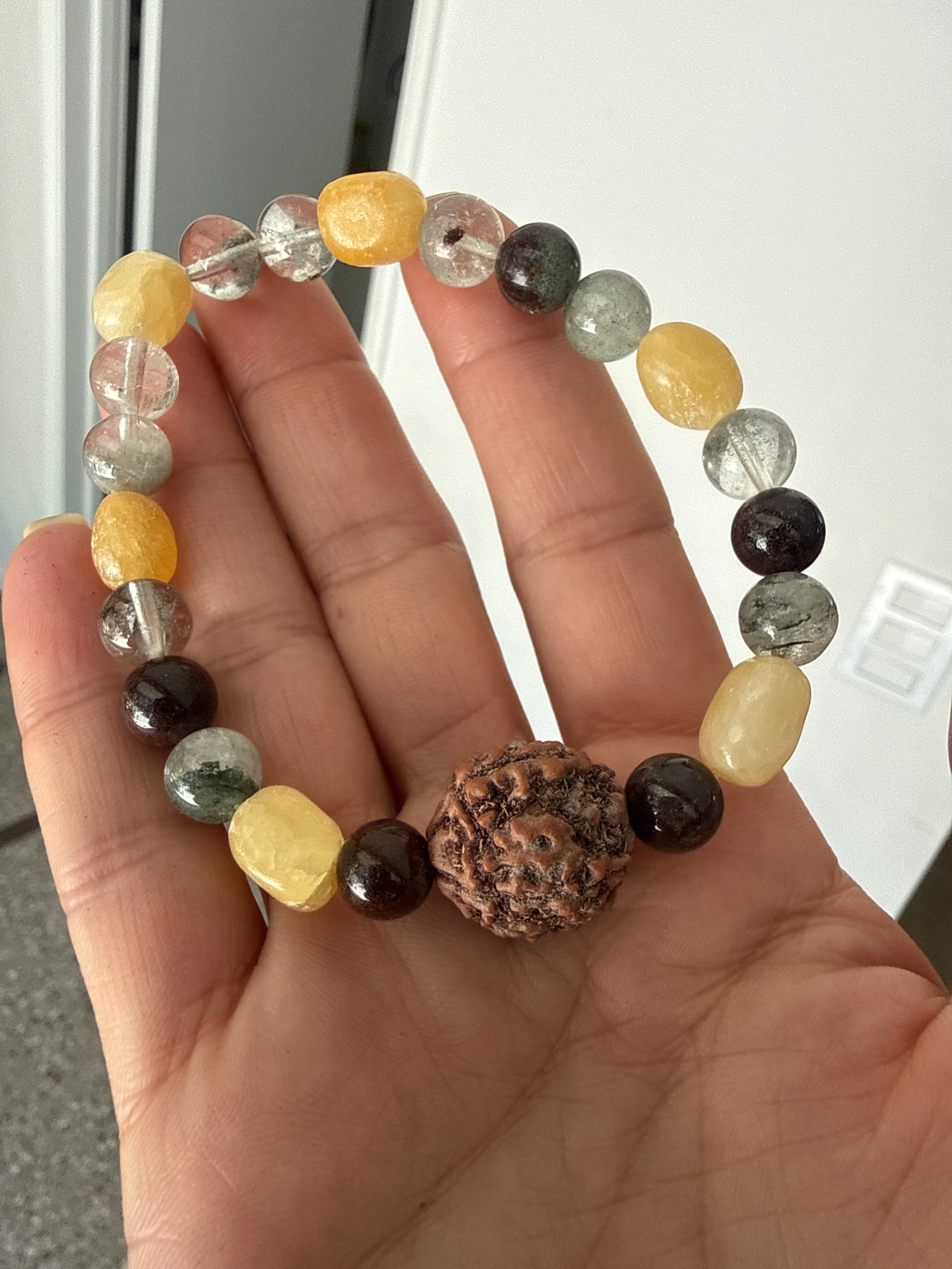 Rudraksha seed with warm honey sacred calcite and mystical lodolite 8 inch