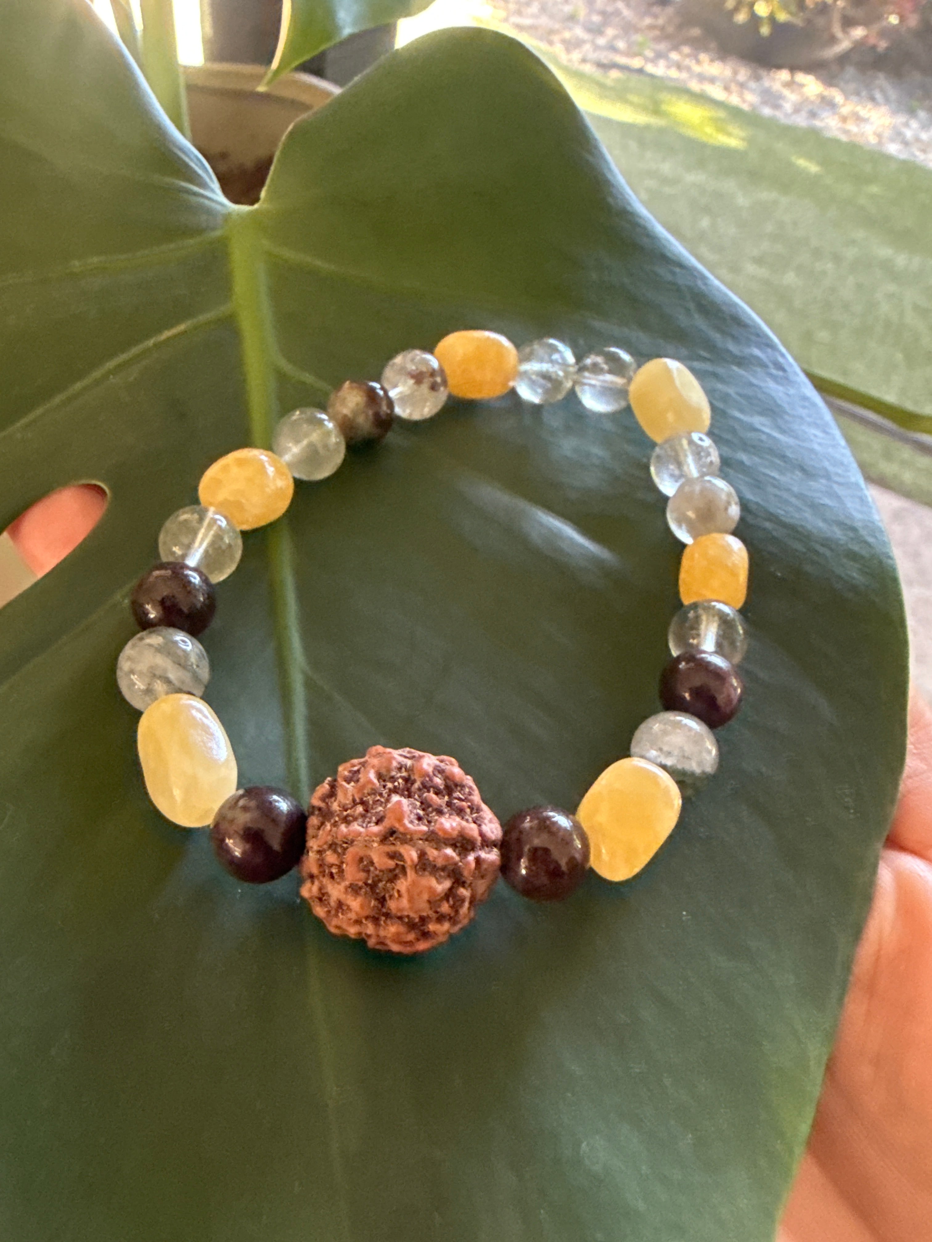 Rudraksha seed with warm honey sacred calcite and mystical lodolite 8 inch